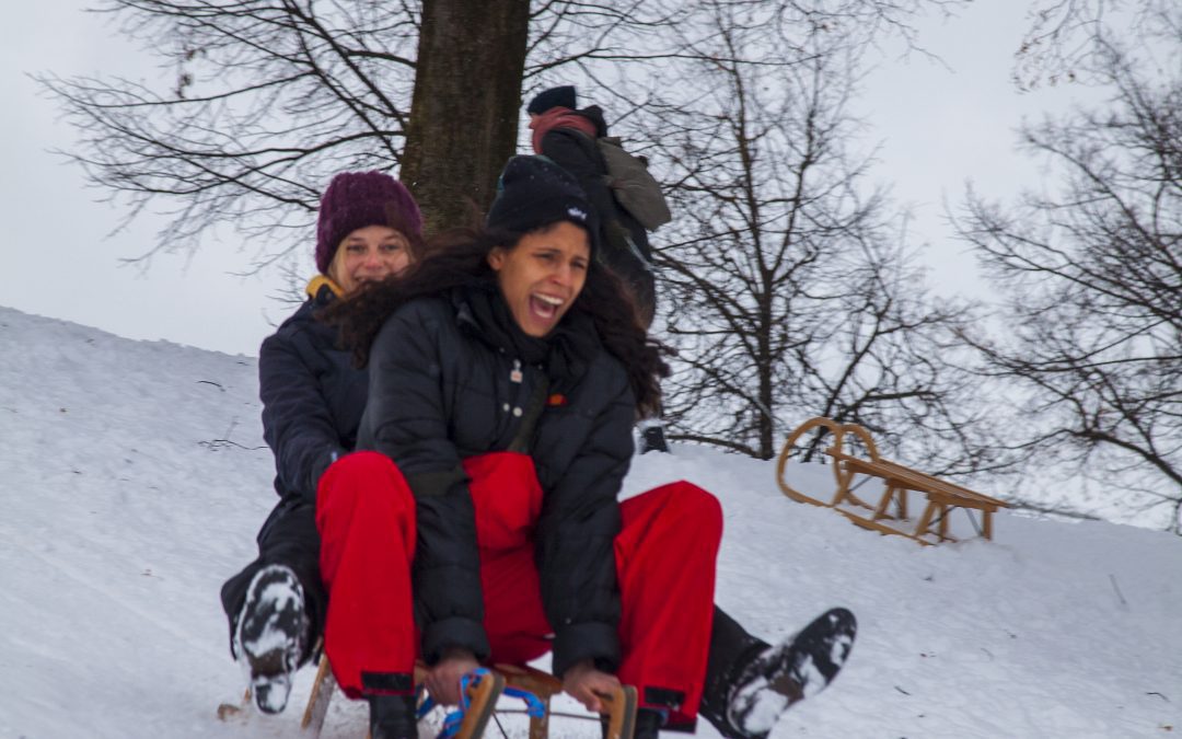 Winter in München Schlittenfahren